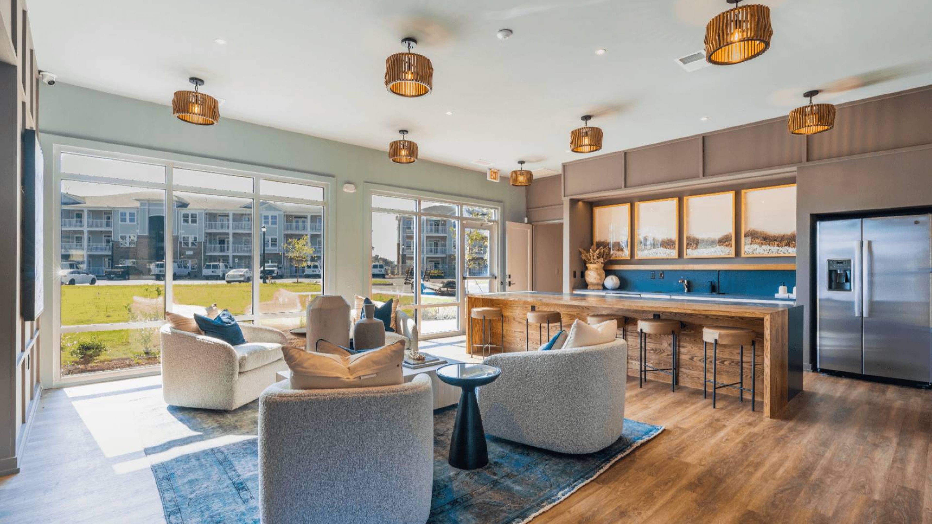 Hawthorne Waterway resident clubhouse amenity with seating area and beautiful finishes